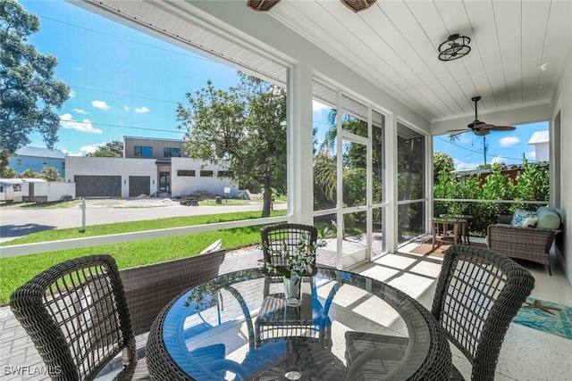 3980 Full Moon Ct, Naples, FL 34112 - sunroom / solarium with ceiling fan and healthy amount of natural light