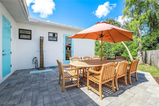 3980 Full Moon Ct, Naples, FL 34112 - view of patio / terrace featuring outdoor dining space