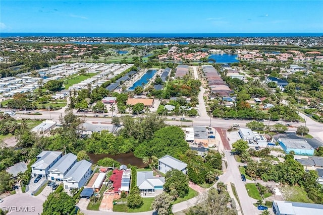 3980 Full Moon Ct, Naples, FL 34112 - aerial view of property and surrounding area with a nearby body of water and nearby suburban area