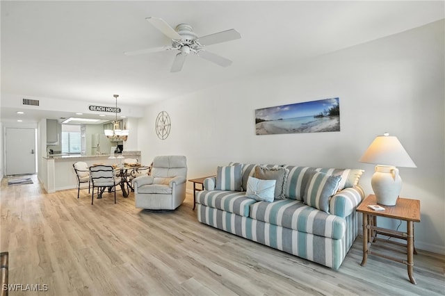 4265 Bay Beach Ln Unit 226, Fort Myers Beach, FL 33931 - living room featuring light wood-style flooring and ceiling fan