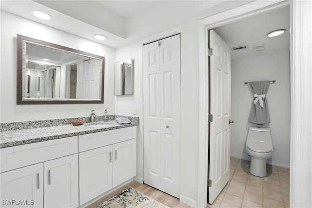 4265 Bay Beach Ln Unit 226, Fort Myers Beach, FL 33931 - bathroom featuring vanity, a closet, and recessed lighting