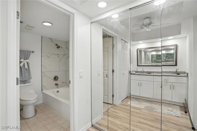 4265 Bay Beach Ln Unit 226, Fort Myers Beach, FL 33931 - bathroom with double vanity, ceiling fan, shower / washtub combination, and recessed lighting