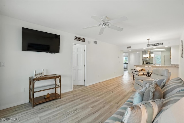 4265 Bay Beach Ln Unit 226, Fort Myers Beach, FL 33931 - living room featuring light wood finished floors, a ceiling fan, and recessed lighting