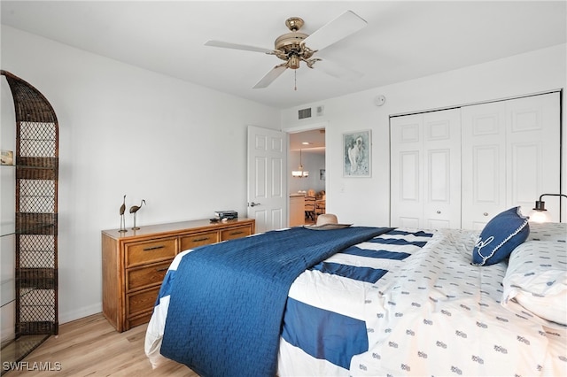 4265 Bay Beach Ln Unit 226, Fort Myers Beach, FL 33931 - bedroom featuring light wood finished floors, a closet, and ceiling fan