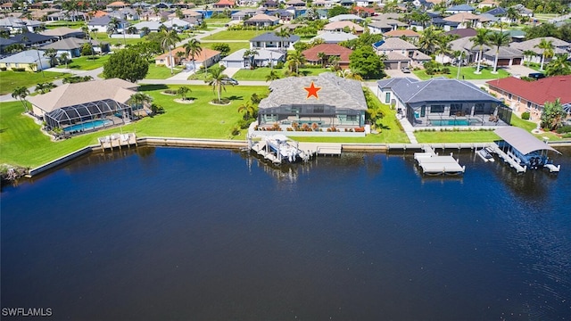 3309 SW 2nd Ln, Cape Coral, FL 33991 - aerial perspective of suburban area featuring a large body of water