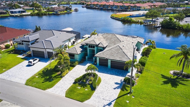 3309 SW 2nd Ln, Cape Coral, FL 33991 - aerial perspective of suburban area with a nearby body of water