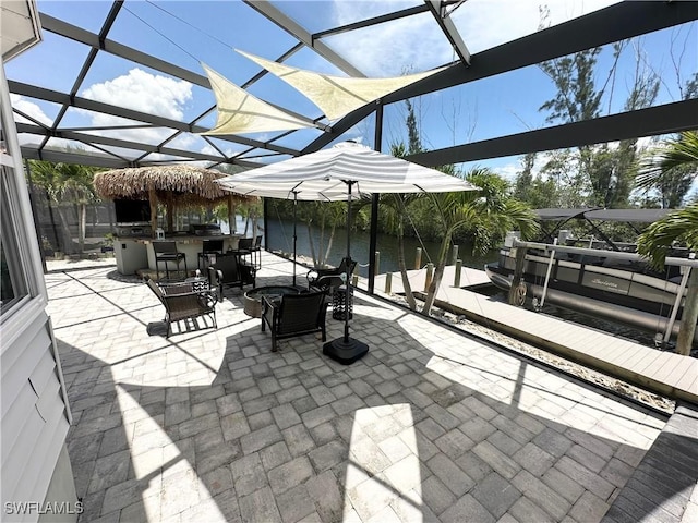 17921 Stevens Blvd, Fort Myers Beach, FL 33931 - view of patio / terrace featuring a lanai and a water view