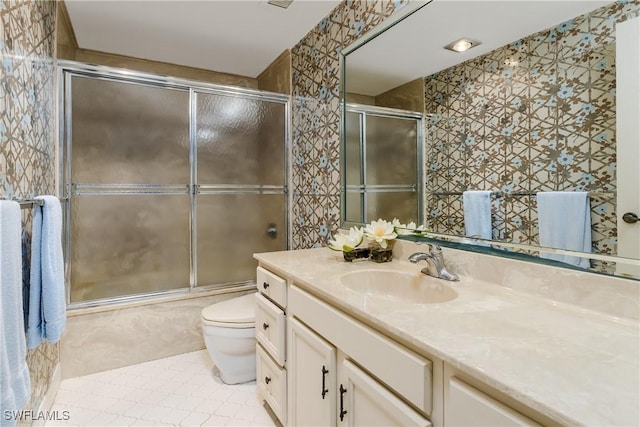 174 S Collier Blvd Unit 904, Marco Island, FL 34145 - bathroom with vanity, shower / bath combination with glass door, and tile patterned flooring