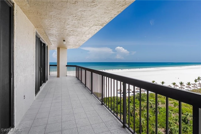 174 S Collier Blvd Unit 904, Marco Island, FL 34145 - balcony featuring view of water and beach