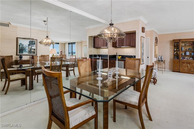 174 S Collier Blvd Unit 904, Marco Island, FL 34145 - dining area with a chandelier, a textured ceiling, ornamental molding, and light carpet