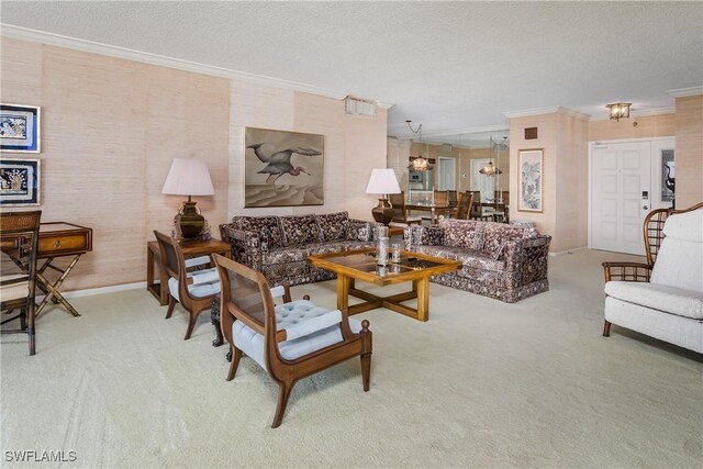 174 S Collier Blvd Unit 904, Marco Island, FL 34145 - carpeted living area with ornamental molding and a textured ceiling