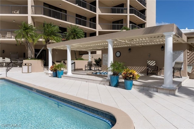 174 S Collier Blvd Unit 904, Marco Island, FL 34145 - community pool with a patio area