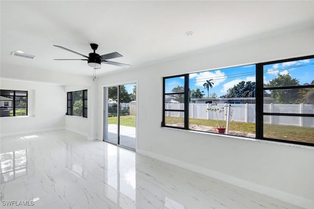 2118 Aldridge Ave, Fort Myers, FL 33907 - empty room with ceiling fan and marble finish flooring