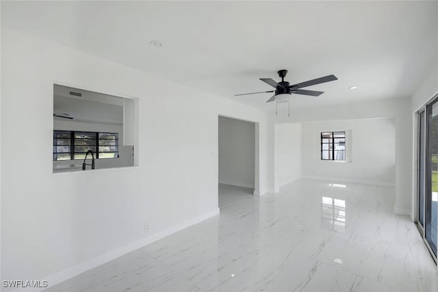 2118 Aldridge Ave, Fort Myers, FL 33907 - unfurnished room with a ceiling fan, recessed lighting, and marble finish flooring