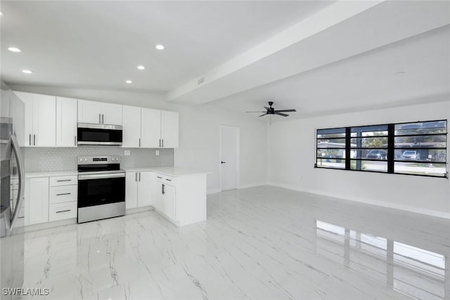2118 Aldridge Ave, Fort Myers, FL 33907 - kitchen featuring stainless steel appliances, a peninsula, recessed lighting, open floor plan, and decorative backsplash