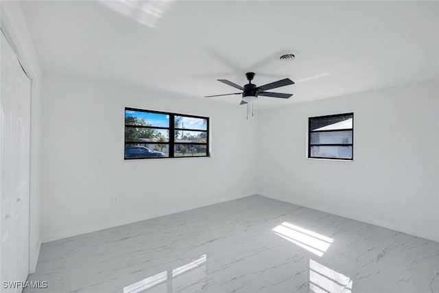 2118 Aldridge Ave, Fort Myers, FL 33907 - spare room with marble finish flooring and ceiling fan