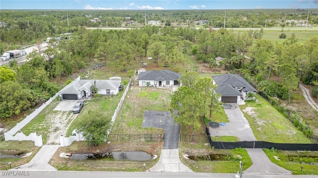 3430 35th Ave NE, Naples, FL 34120 - aerial overview of property's location with a forest