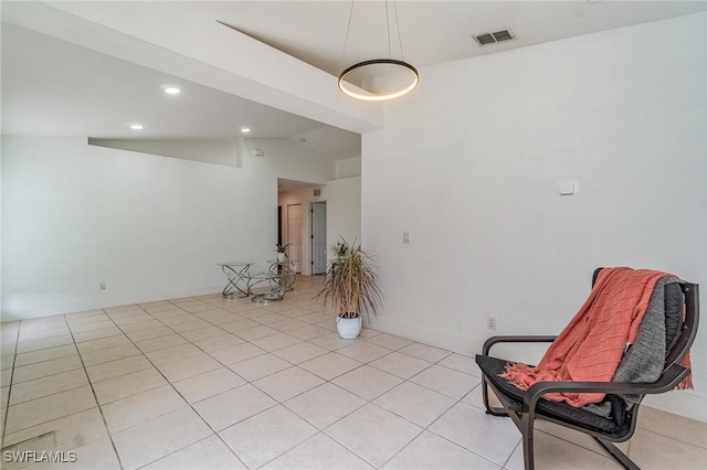 3430 35th Ave NE, Naples, FL 34120 - sitting room featuring lofted ceiling, light tile patterned floors, and recessed lighting