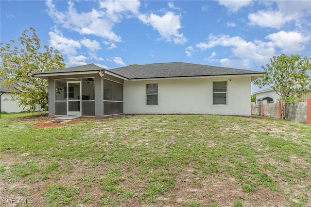 3430 35th Ave NE, Naples, FL 34120 - rear view of house featuring a sunroom and stucco siding