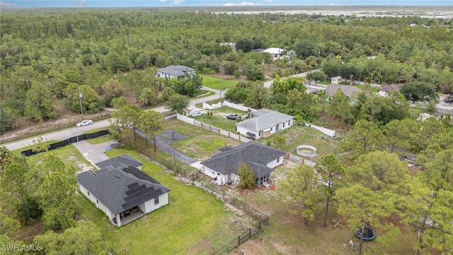 3430 35th Ave NE, Naples, FL 34120 - aerial view of property and surrounding area featuring a heavily wooded area and nearby suburban area