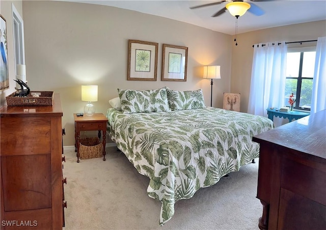 16200 Bay Pointe Blvd Unit 104, North Fort Myers, FL 33917 - carpeted bedroom featuring baseboards and a ceiling fan