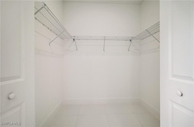 2109 Jefferson Ave, Alva, FL 33920 - walk in closet featuring light tile patterned floors
