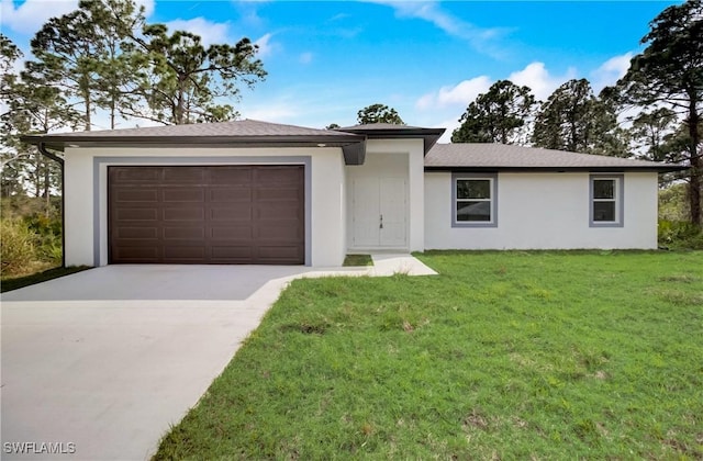 2109 Jefferson Ave, Alva, FL 33920 - view of front of house featuring stucco siding, driveway, and an attached garage