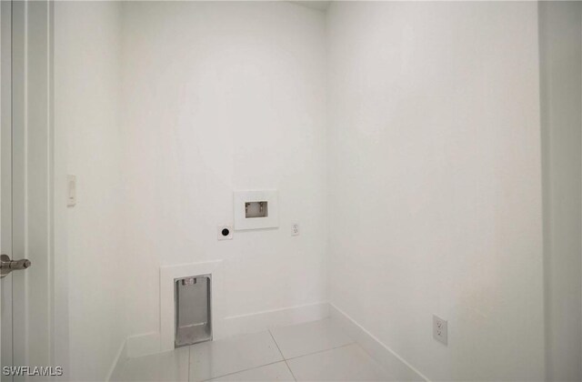 2109 Jefferson Ave, Alva, FL 33920 - washroom featuring hookup for an electric dryer, washer hookup, and tile patterned flooring