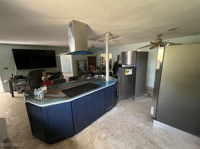 1262 Joerin Ave, North Fort Myers, FL 33903 - kitchen featuring black electric stovetop, freestanding refrigerator, island exhaust hood, open floor plan, and blue cabinets
