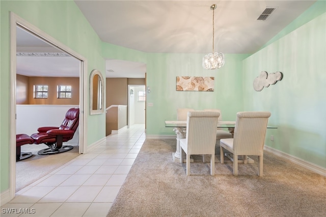 15041 Lakeside View Dr Unit 2104, Fort Myers, FL 33919 - dining space with light colored carpet, a chandelier, light tile patterned floors, and healthy amount of natural light