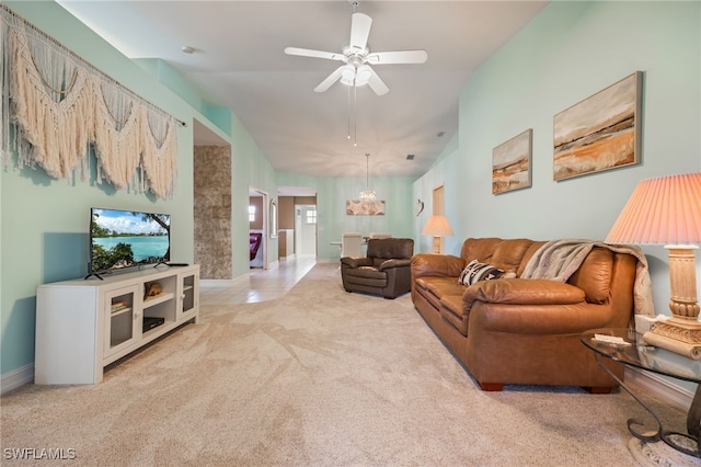 15041 Lakeside View Dr Unit 2104, Fort Myers, FL 33919 - carpeted living room with ceiling fan, healthy amount of natural light, and vaulted ceiling