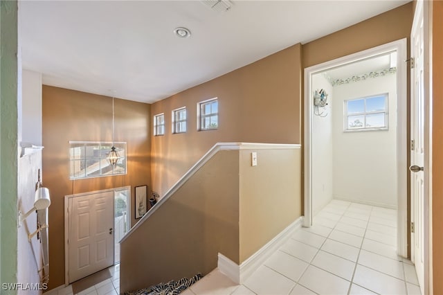 15041 Lakeside View Dr Unit 2104, Fort Myers, FL 33919 - entryway featuring healthy amount of natural light and tile patterned flooring