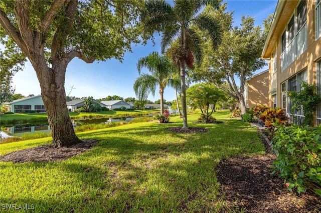 15041 Lakeside View Dr Unit 2104, Fort Myers, FL 33919 - view of green lawn with a water view and a residential view