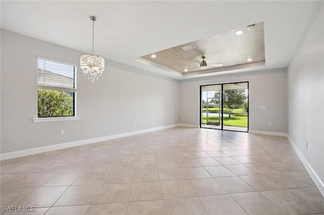 17215 Hadlow Pl, Fort Myers, FL 33967 - unfurnished room with a raised ceiling, a chandelier, light tile patterned flooring, ceiling fan, and recessed lighting