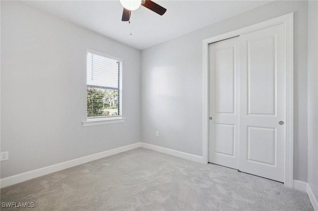 17215 Hadlow Pl, Fort Myers, FL 33967 - unfurnished bedroom featuring carpet flooring, a closet, and a ceiling fan