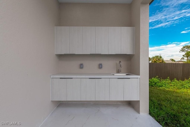 3209 22nd St SW, Lehigh Acres, FL 33976 - exterior space featuring a sink and stucco siding
