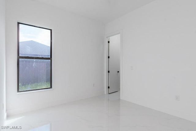 3209 22nd St SW, Lehigh Acres, FL 33976 - empty room with light marble finish floors