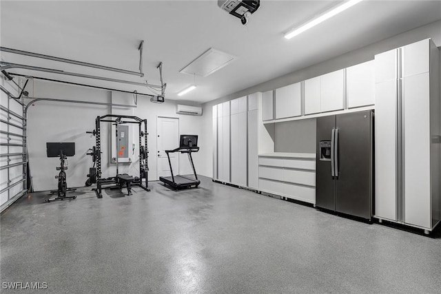 234 Legacy Ct, Naples, FL 34110 - garage with refrigerator with ice dispenser, a wall mounted air conditioner, and a garage door opener