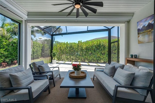 234 Legacy Ct, Naples, FL 34110 - sunroom featuring ceiling fan and outdoor lounge area