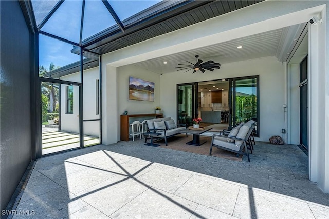 234 Legacy Ct, Naples, FL 34110 - view of patio with ceiling fan, an outdoor living space, and a lanai