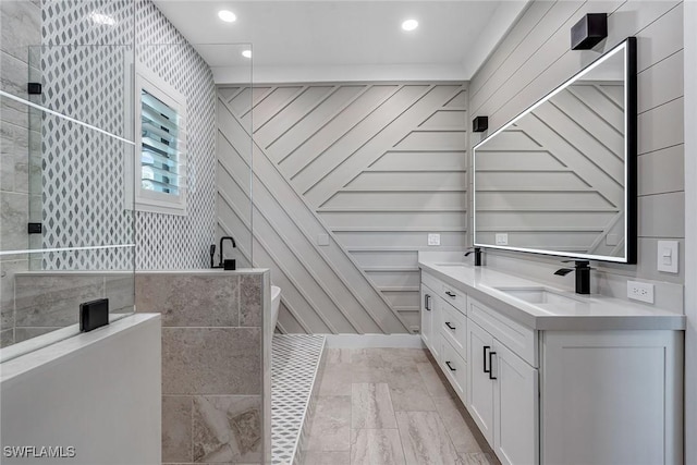 234 Legacy Ct, Naples, FL 34110 - full bath with double vanity, a walk in shower, and recessed lighting