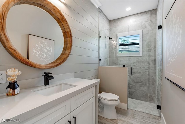 234 Legacy Ct, Naples, FL 34110 - bathroom with vanity, a shower stall, and recessed lighting