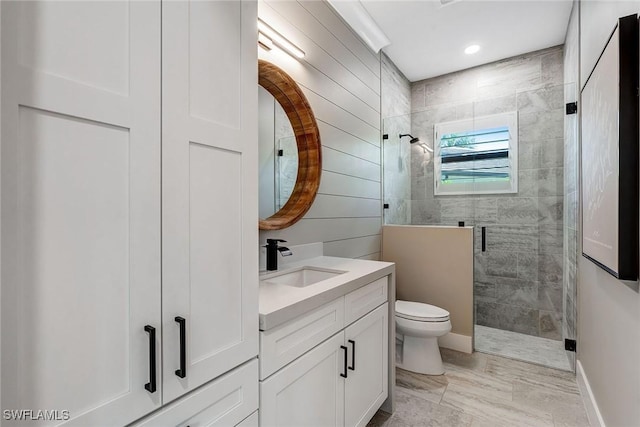 234 Legacy Ct, Naples, FL 34110 - full bath featuring a shower stall, vanity, marble finish floors, and recessed lighting