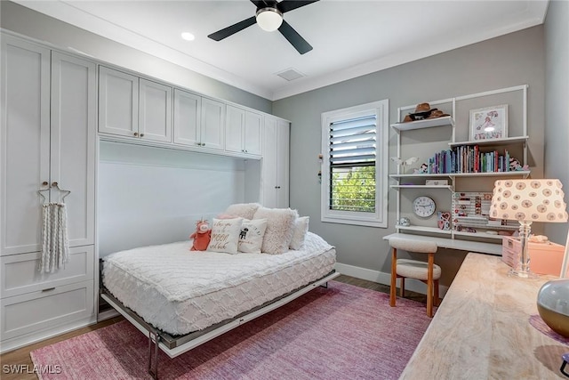 234 Legacy Ct, Naples, FL 34110 - bedroom featuring wood finished floors, ceiling fan, and ornamental molding