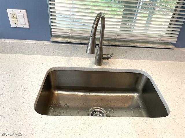 200 W 17th St, Lehigh Acres, FL 33972 - kitchen view of a sink and stone countertops