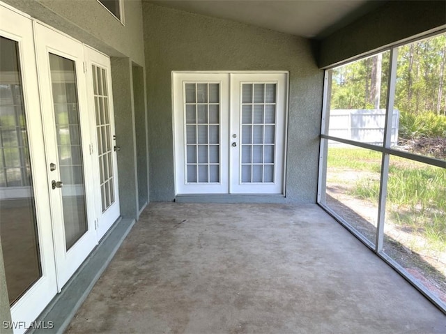 200 W 17th St, Lehigh Acres, FL 33972 - unfurnished sunroom featuring french doors and lofted ceiling