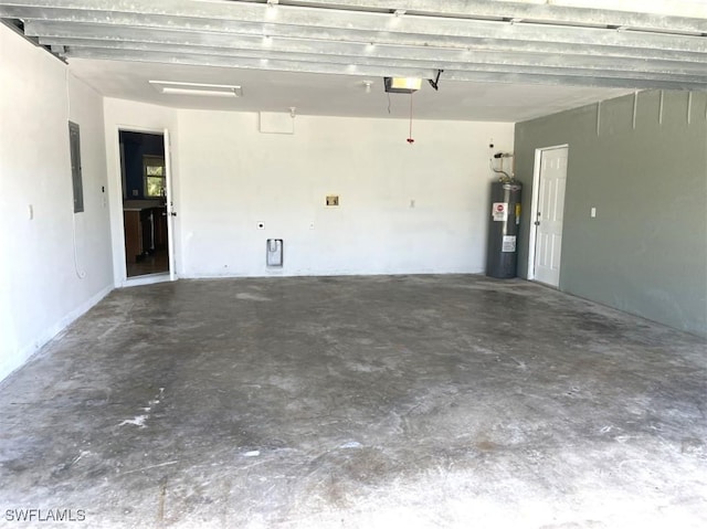 200 W 17th St, Lehigh Acres, FL 33972 - garage with water heater and a garage door opener