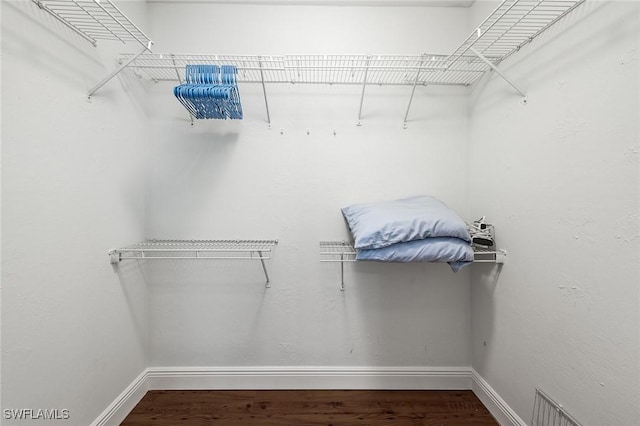 4108 SW 6th Ave, Cape Coral, FL 33914 - spacious closet featuring wood finished floors