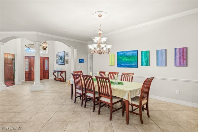 5251 Westminster Dr, Fort Myers, FL 33919 - dining space featuring ornate columns, light tile patterned flooring, a chandelier, crown molding, and arched walkways