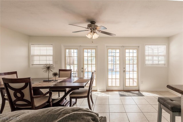 3042 SW 10th Pl, Cape Coral, FL 33914 - dining area with french doors, plenty of natural light, ceiling fan, and light tile patterned floors